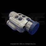 Tan and black thermal monocular with control buttons.