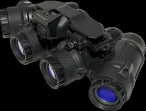 Black four-lens goggles, blue glass, textured grips.